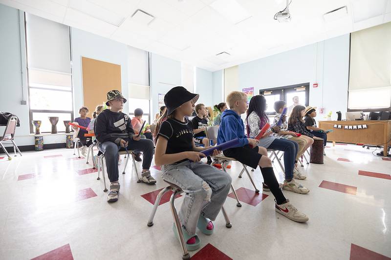 Third graders in Nolan Lewis’ music class at Jefferson School in Dixon work in their “Boomwhacker” skills Friday, April 21, 2023. The instruments are plastic tubes the student play by smacking or hitting that produces a tone. A video is shown for the students to follow along to know when to play.