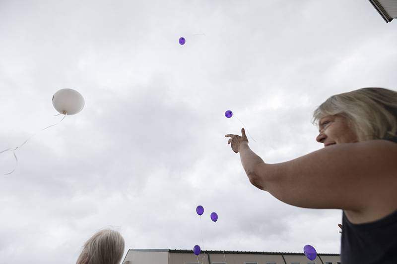 Balloons, released from survivors, soar as a symbol of releasing the pain, anxiety and uncertainty of cancer Saturday, June 8, 2024, during the Relay for Life fundraiser. Eighteen survivors with a total of 224 years of survivorship took part in the event.