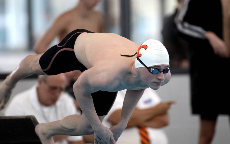 St. Charles East’s Kyle Algrim takes off the blocks for the consolation heat of the 200-yard freestyle during the IHSA Boys State Championships at FMC Natatorium in Westmont on Saturday, Feb. 25, 2023.