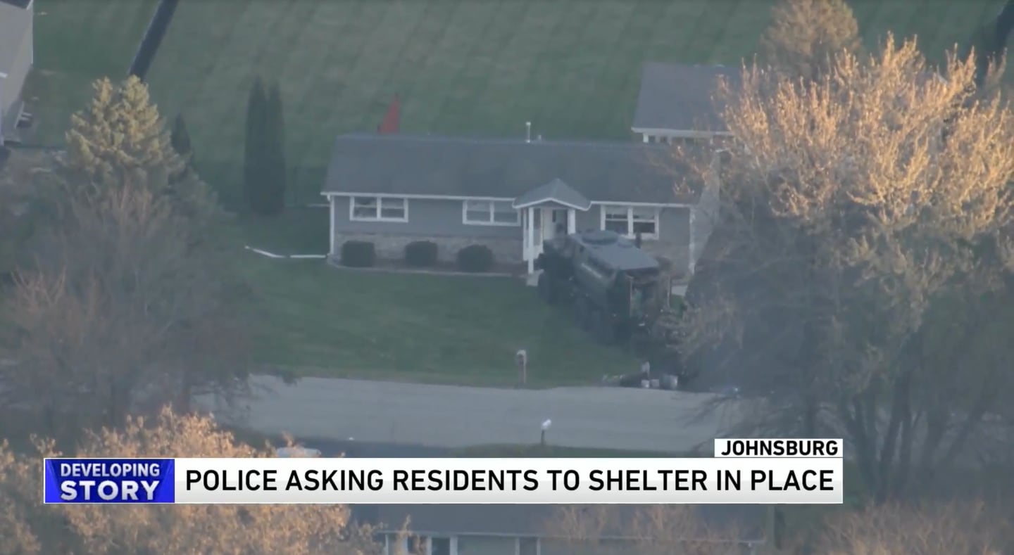 An aerial view of a police vehicle outside a Johnsburg home where a standoff occurred on Wednesday, Nov. 15, 2023. (Screen image courtesy of WGN-TV Chicago)