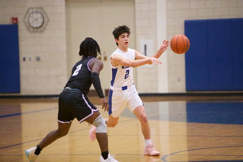 Geneva's Gabe Jensen makes a pass against Hampshire at Geneva Day of Hoops on Monday, Jan. 15th in Geneva.