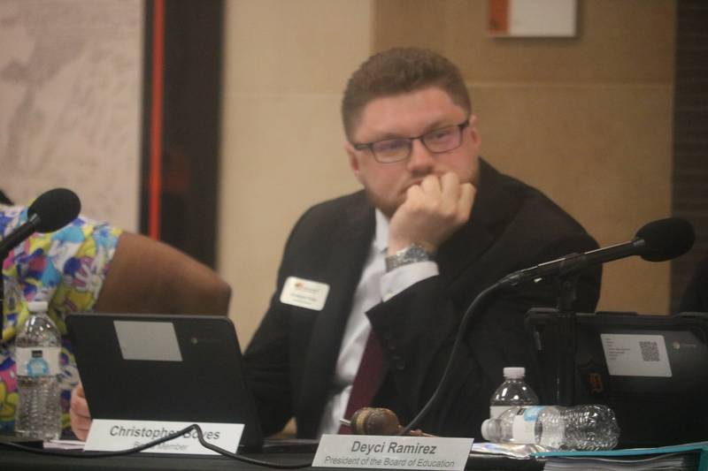 Christopher Boyes sits in on the May 7, 2024 meeting of the DeKalb School District 428 board.