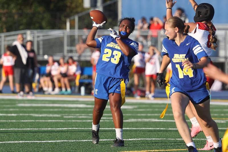 Joliet Central’s Georgianna Majerus passes in their inaugural flag football game against Brady-Bourbonnais on Thursday, August 29, 2024 in Joliet.