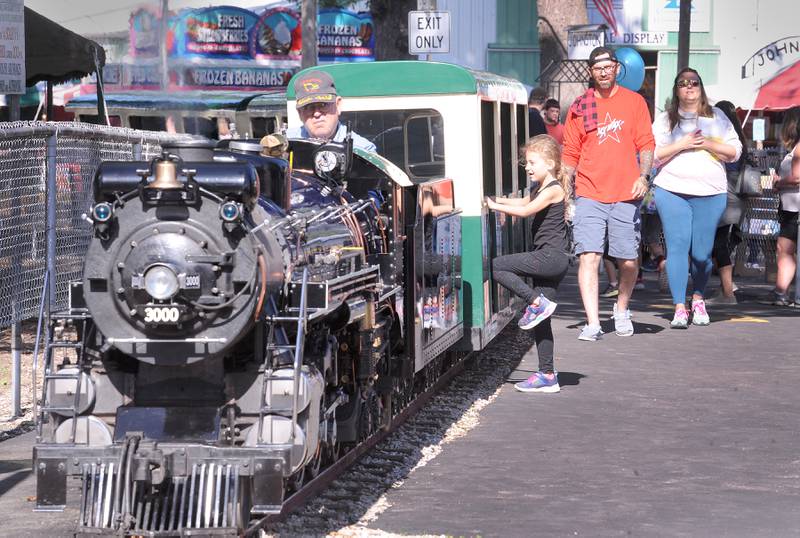 Augie Otto's train loads passengers for another trip during the Sandwich Fair on Saturday, Sept. 9, 2023.