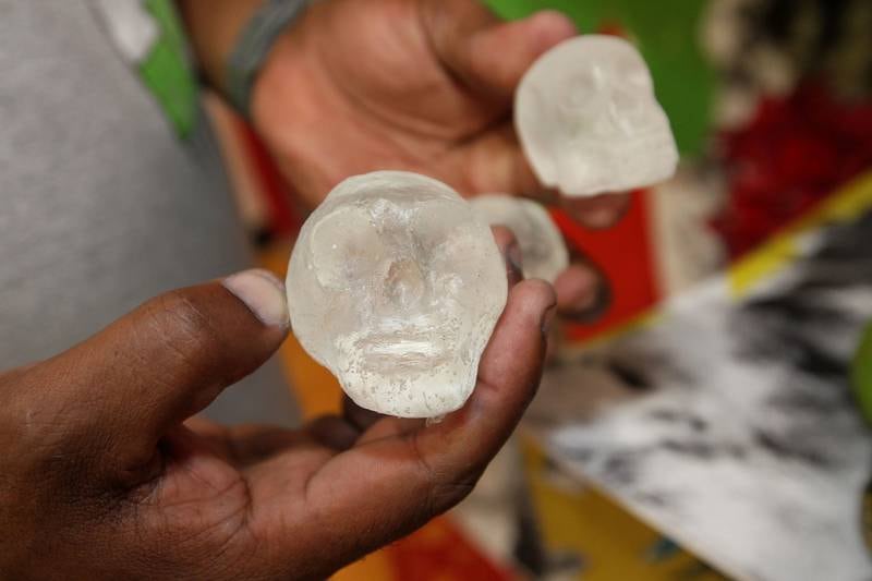 Lemar Wilson, of Grayslake, art teacher at Stanton, holds sugar skulls made out of resin his students made at school to put on their altar for Dia de los Muertos, Day of the Dead event at Stanton Middle School on November 3rd in Fox Lake. The event was sponsored by the Bilingual Parents Advisory Committee (BPAC) from School Districts 114,124 and 37.
Photo by Candace H. Johnson for Shaw Local News Network