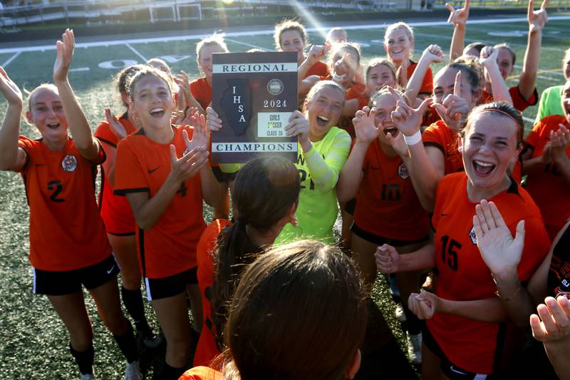 Crystal Lake Central players celebrate their win over Wauconda in the IHSA Class 2A Grayslake North Regional championship soccer match on Friday, May 17, 2024, at Grayslake North High School.