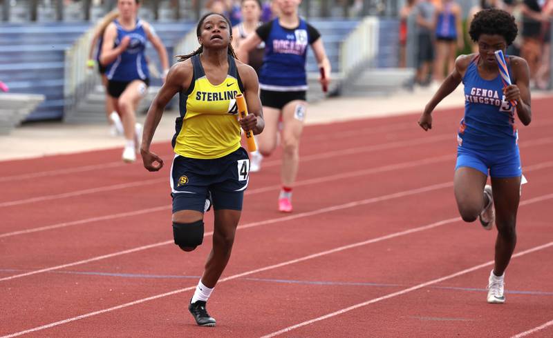 Sterling’s Taah Liberty leads as she runs the final leg of the 4x100 relay Wednesday, May 8, 2024, during the girls track Class 2A sectional at Rochelle High School.