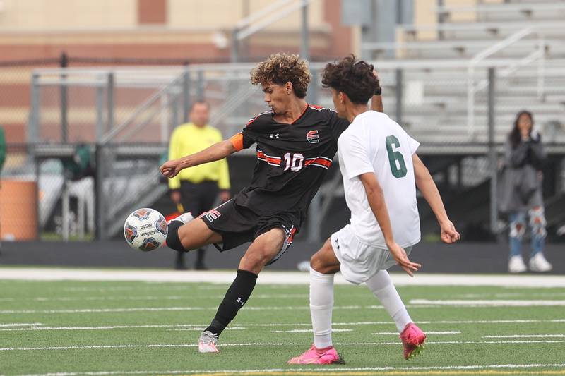 Plainfield East’s Yandel Reyes takes a shot against Plainfield Central on Tuesday, Sept. 19, in Plainfield.