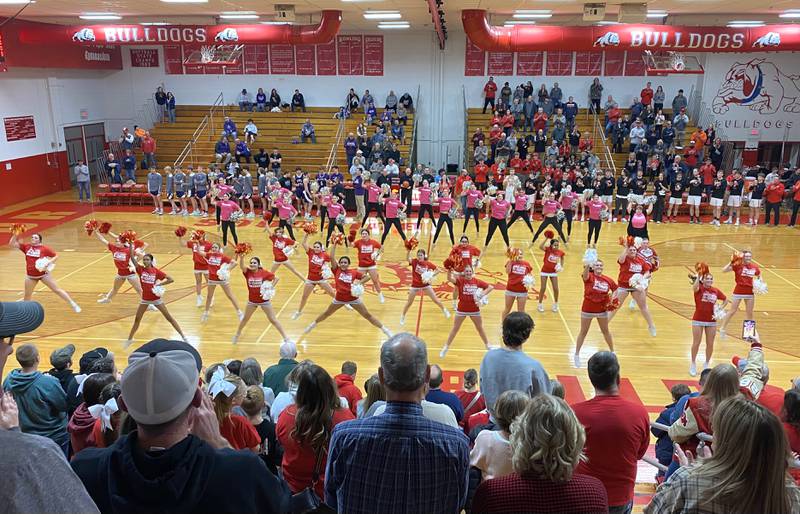 The Streator cheerleaders and Streatorettes perform during "Streator Loyalty" before the Bulldogs' game with Wilmington on Tuesday, Feb. 13, 2024, at Pops Dale Gymnasium.