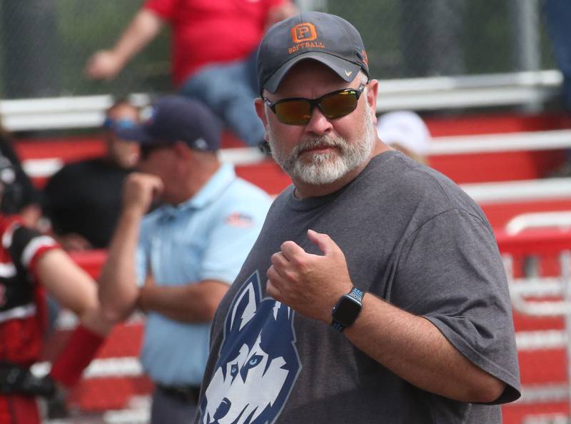 Oak Park-River Forest head softball coach JP Coughlin visits the mound against Yorkville during the Class 4A State semifinal softball game on Friday, June 9, 2023 at the Louisville Slugger Sports Complex in Peoria.