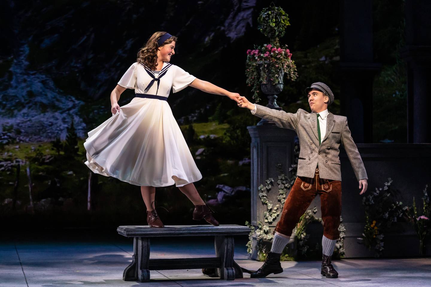 Liesl (Julia Aragon (left) is 16, going on 17, and it’s Rolf (Michael Harp) who has captured her interest in Paramount Theatre’s holiday season production, The Sound of Music. Rodgers and Hammerstein’s beloved musical runs November 9, 2022-January 14, 2023 at Paramount Theatre, 23 E. Galena Blvd. in downtown Aurora. Tickets: paramountaurora.com or (630) 896-6666. Credit: Liz Lauren