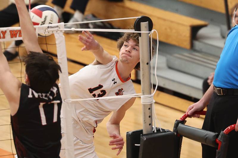 Lincoln-Way West’s Hunter Vedder hits a shot against Plainfield North on Monday, March 18, 2024 in New Lenox.