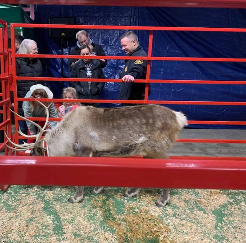 DeKalb County area first responders and their families were treated to a special meeting with Santa Claus and a real reindeer Dec. 13, 2023, as part of an appreciation open house put on by Zenz Buildings and Whispering Pines Reindeer Ranch.