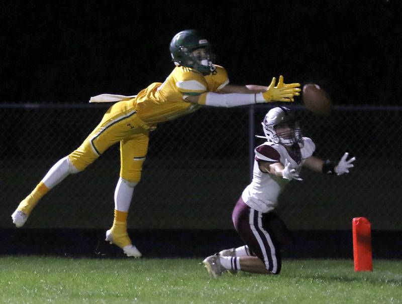 Crystal Lake South's Gavin Hastings tries to catch a pass in front Prairie Ridge's Nick Petty during a Fox Valley Conference football game on Friday, Sept. 6, 2024, at Crystal Lake South High School.