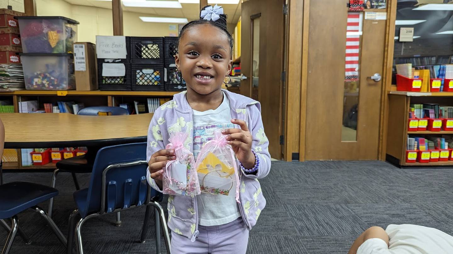 On April 15, volunteers from two Joliet nonprofits – the Zonta Club of Joliet and Visitation and Aid Society – hosted a “jewelry gift shop” of gently used bracelets earrings, necklaces for the students at Edna Keith, M.J. Cunningham Elementary, and Sator Sanchez and Thomas Jefferson elementary schools to give on Mother’s Day. La'Milian Griffin proudly shows off her selections.