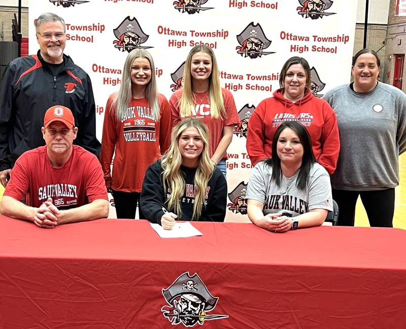 Ottawa’s Reese Burgwald has signed on to continue her education at Sauk Valley Community College in Dixon and her volleyball career at the NJCAA level with the Skyhawks. Joachim, who earned honorable mention status on the 2023 Times All-Area Girls Volleyball Team, is pictured here (center, in front) at her signing ceremony surrounded by family and her volleyball coaches.