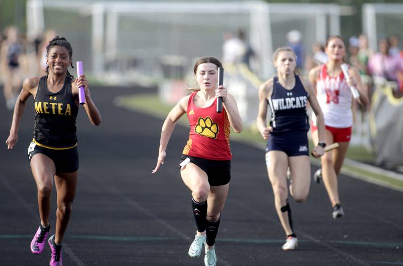 Batavia’s Isabelle Taylor (center) runs the anchor leg of the 4 x 100-meter relay during the Class 3A Metea Valley girls track and field sectional on Thursday, May 11, 2023.