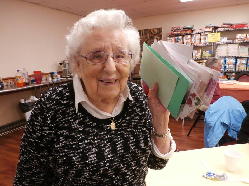 Joyce Mohr of Johnsburg turned 100 on April 30, 2024. She holds dozens of cards she received.