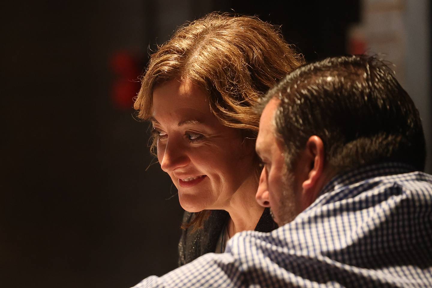 City Clerk Christa Desiderio speaks with Joliet Detective Anton “Tony” Lakota at a hearing on the validity of nominating petitions of several City Council candidates at the Joliet City Electoral Board meeting on January 4th.