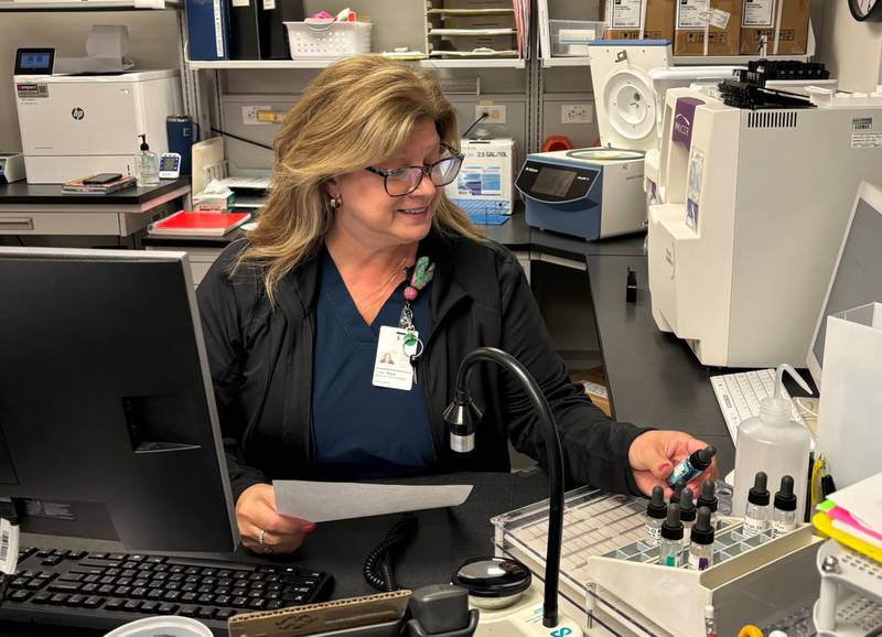 A medical technologist processes specimens in the laboratory at Morris Hospital, which recently earned its 17th accreditation from the College of American Pathologists.