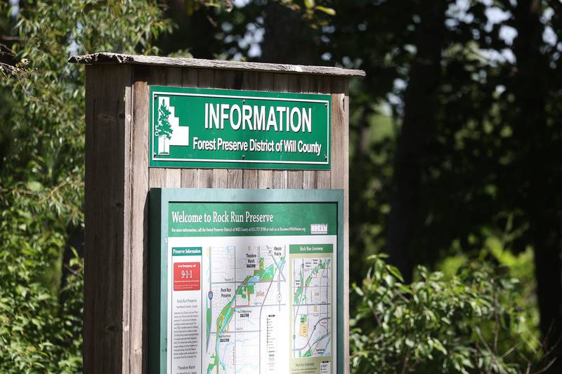 An information sign sits at the start of a trail at the Forest Preserve District of Will County Rock Run Preserve on Thursday June 6, 2024 in Joliet.