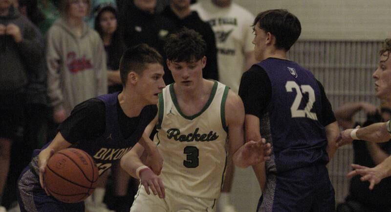 Dixon's Cullen Shaner brings the ball upcourt against Rock Falls during their game Tuesday, Feb. 6, 2024, at Rock Falls High School.