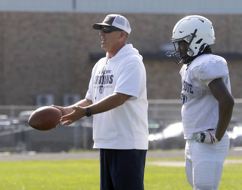 Cary-Grove head coach Brad Seaburg
Talks to his players during football practice Tuesday, Aug. 20, 2024, at Cary-Grove High School, as the 2023 IHSA Class 6A champions look to defend their title.