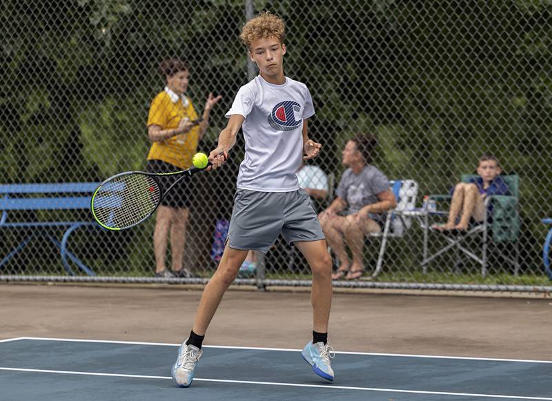 Aaron Rivera plays a shot Wednesday, July 27, 2023 while playing mixed doubles in the Emma Hubbs Tennis Classic in Dixon.