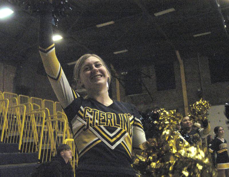 Sterling Cheerleader Grace Johnson chhers the crowd on during Sterling’s 3A Regional semifinal game Wednesday, Feb. 21, 2024, at Sterling High School.