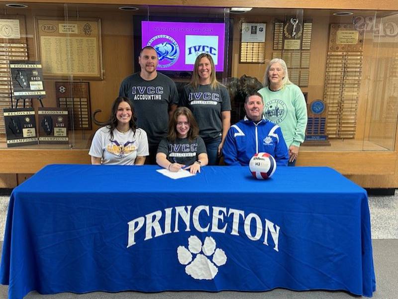 Princeton senior setter Natasha Faber-Fox signs to play volleyball for IVCC. She was a First-Team All-BCR selection and a Second- Team NewsTribune selection. She was joined at her signing by (front row, from left) IVCC coach Kaitlyn Edgcomb and PHS coach Andy Puck; and (back row) step-dad Scott Fox, her mom Amber Fox and grandma Laura Harris.