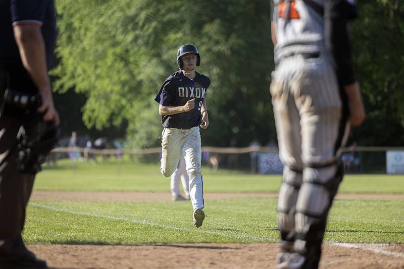 Dixon’s Collin Scott comes in to score against Freeport Thursday, May 23, 2024 during the Class 3A regional semifinal in Dixon.