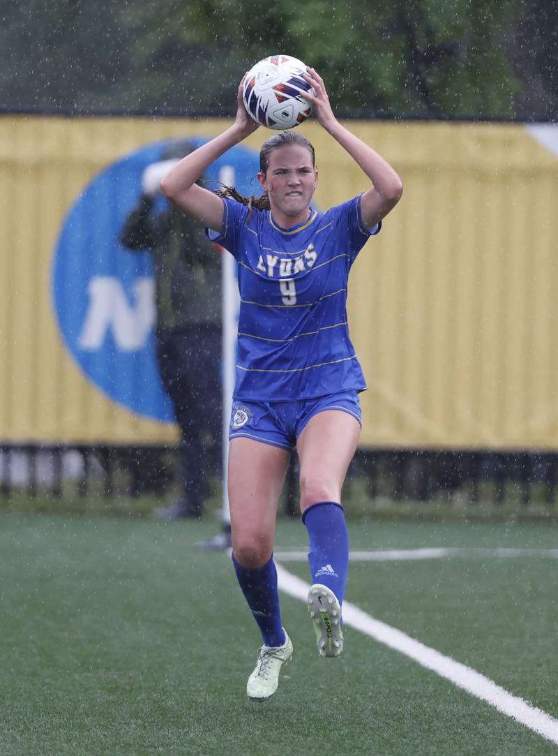 Lyons' Claire Mortonson (9) throws the ball back into play during the Class 3A Dominican super-sectional between New Trier and Lyons Township in River Forest on Tuesday, May 28, 2024.