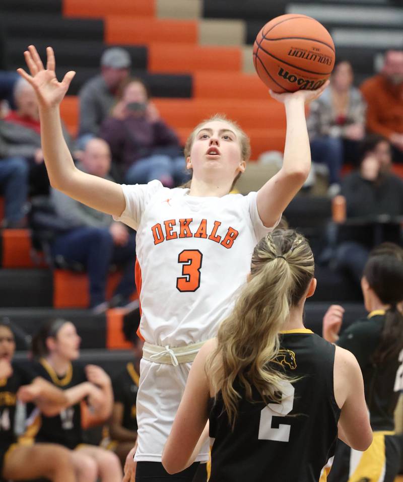 DeKalb’s Olivia Schermerhorn shoots over Metea Valley's Emma Martin during their game Friday, Jan. 19, 2024, at DeKalb High School.