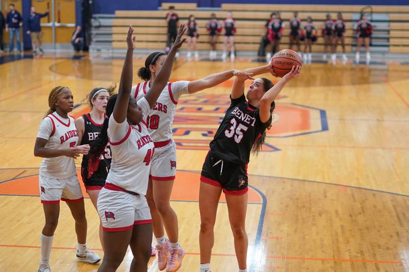 Benet’s Emilia Sularski (35) shoots the ball in the post against Bolingbrook's Trinity Jones (10) during a Oswego semifinal sectional 4A basketball game at Oswego High School on Tuesday, Feb 20, 2024.