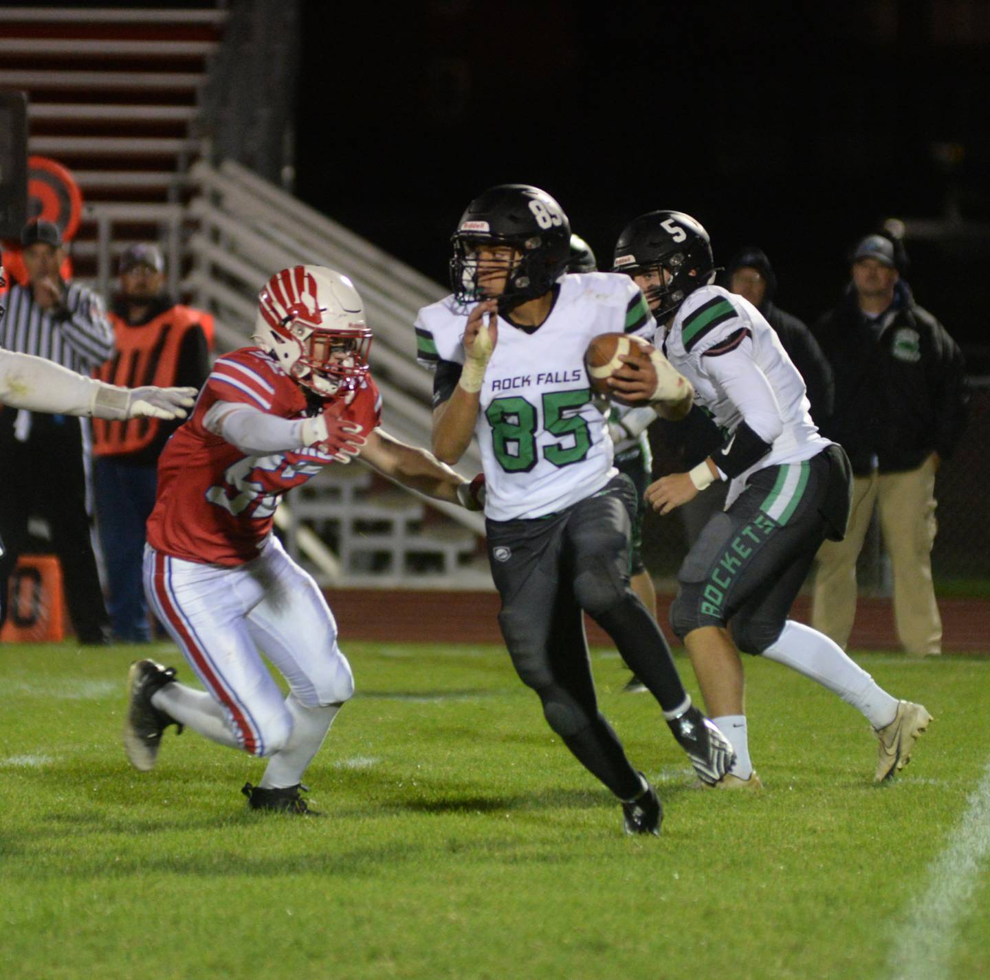 Rock Falls' Devin Taunton-DeJesus (85) looks for a gap as Oregon's Noah Hodges (52) chases him during Friday, Oct. 6, 2023 action at Oregon High School's Landers-Loomis Field.