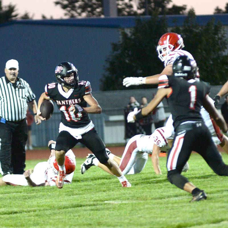 Erie-Prophetstown's Keegan Winckler (10) runs with the ball against Hall on Friday, Sept. 6, 2024 in Prophetstown.