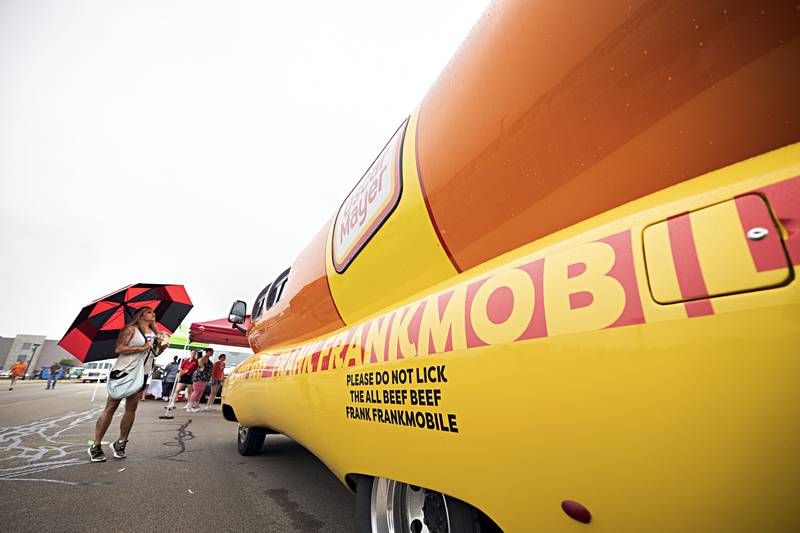 Tasha Anderson of Rock Falls gets an eyeful of the Oscar Mayer Frankmobile Friday, June 30, 2023 as it makes a stop in Rock Falls.