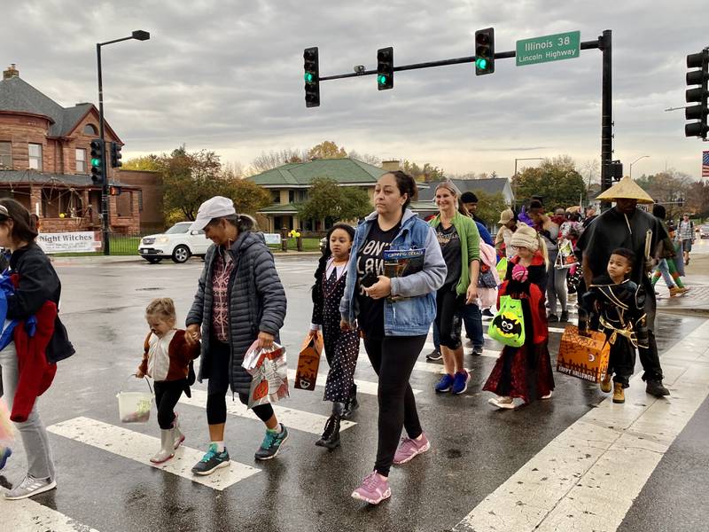 Costume-clad families took downtown DeKalb by storm Thursday, Oct. 26, 2023 for the 26th annual Spooktacular trick-or-treating event hosted by the DeKalb Chamber of Commerce.