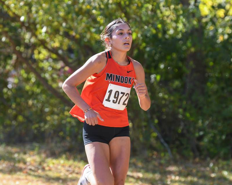 Maya Ledesma of Minooka runs during the Southwest Prairie Conference meet on Friday Oct. 18, 2024, held at Channahon Community Park in Channahon where she took first place with a time of 17:03.20.