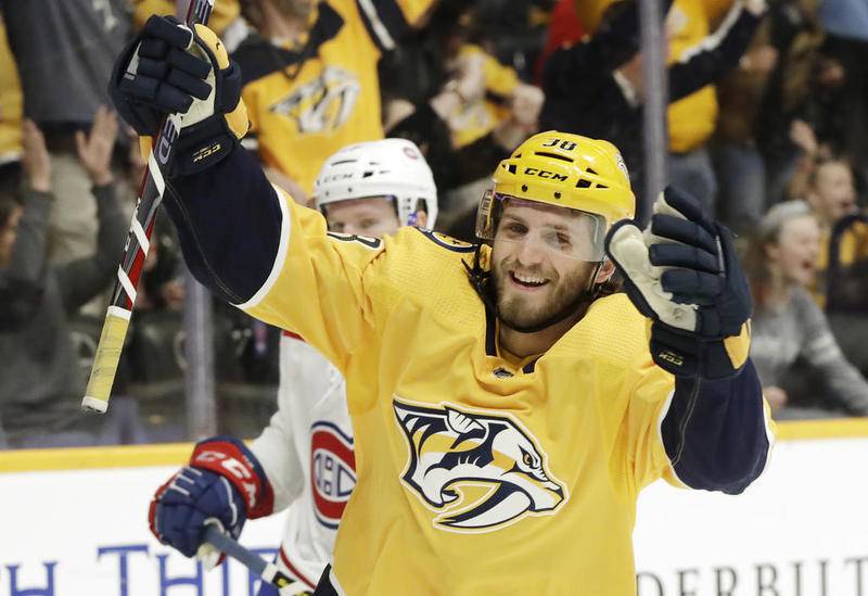 Nashville Predators right wing Ryan Hartman, a West Dundee native, celebrates after scoring a goal against the Montreal Canadiens on Feb. 19 in Nashville, Tenn. Hartman agreed to a two-year deal worth $3.8 million with the Minnesota Wild on Monday.