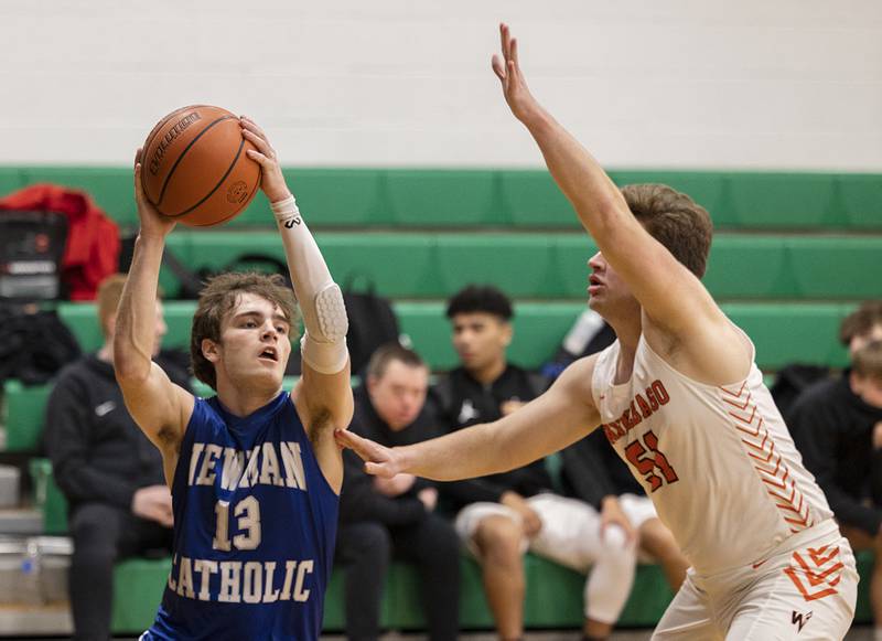 Newman’s Nolan Britt handles looks to pass while being defended by Winnebago’s Will Speltz Saturday, Jan. 7, 2023 at the Rock Falls Shootout.