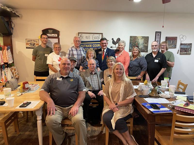 Putnam County Rotary Members welcomed Rotary District Governor Dave Emerick (standing, center) and Assistant District Governor Tracy Grimmer (seated in front of Governor Emerick) at the Club’s August 3 meeting at LJ’s Garden Café in Magnolia.