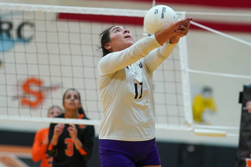 Plano's Rita Lauro (17) bump sets the ball against Sandwich during a volleyball match at Sandwich High School on Tuesday, Sep 10, 2024.