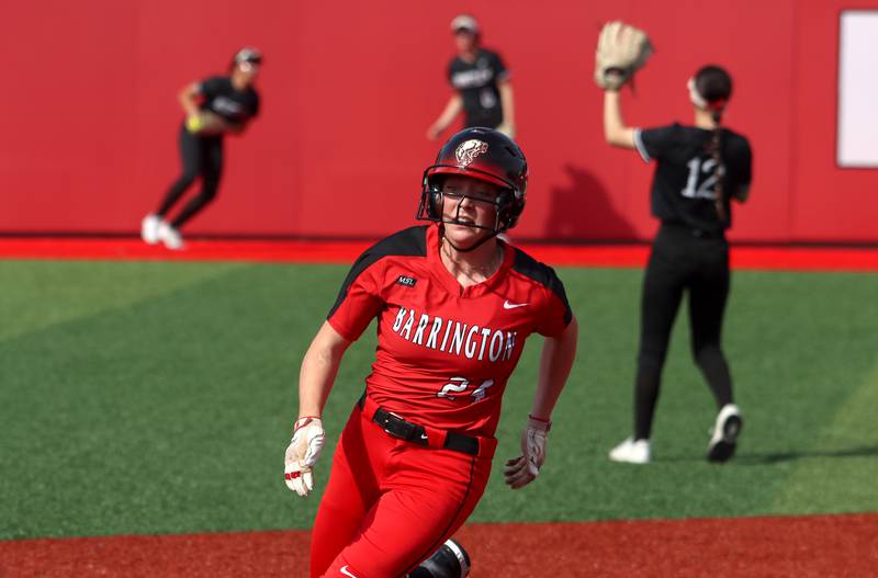 Barrington’s Amelia Cline cruises around third base en route to scoring early against Huntley in sectional final softball  action at Barrington Friday.