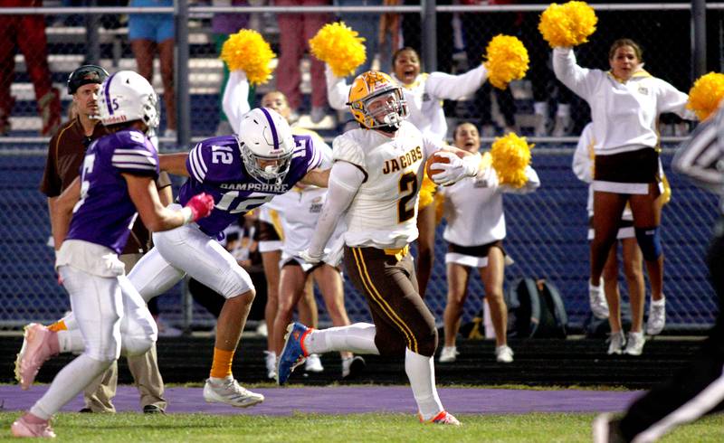 Jacobs’ Caden DuMelle make a long run in varsity football on Friday, Sept. 6, 2024, at Hampshire School in Hampshire.