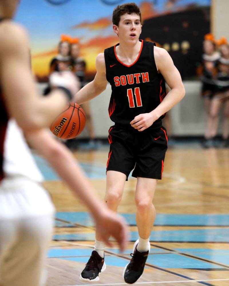 Wheaton Warrenville South’s Matt Nadelhoffer dribbles the ball during a Class 4A Willowbrook Regional semifinal game against Geneva on Wednesday, Feb. 21, 2024.