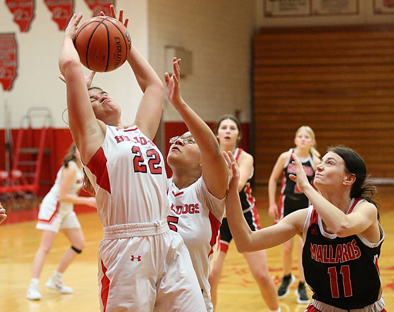 Streator's Charlee Bourell (left) grabs a rebound over Henry-Senachwine's Daphaney Kessling (right) on Wednesday, Jan,. 4, 2023 at Streator High School.