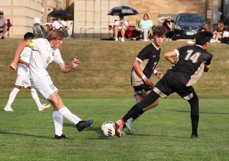 Sycamore's Javier Lopez blocks the shot attempt of Kaneland's Matthew Mitchinson during their game Wednesday, Sept. 18, 2024, at Sycamore High School.