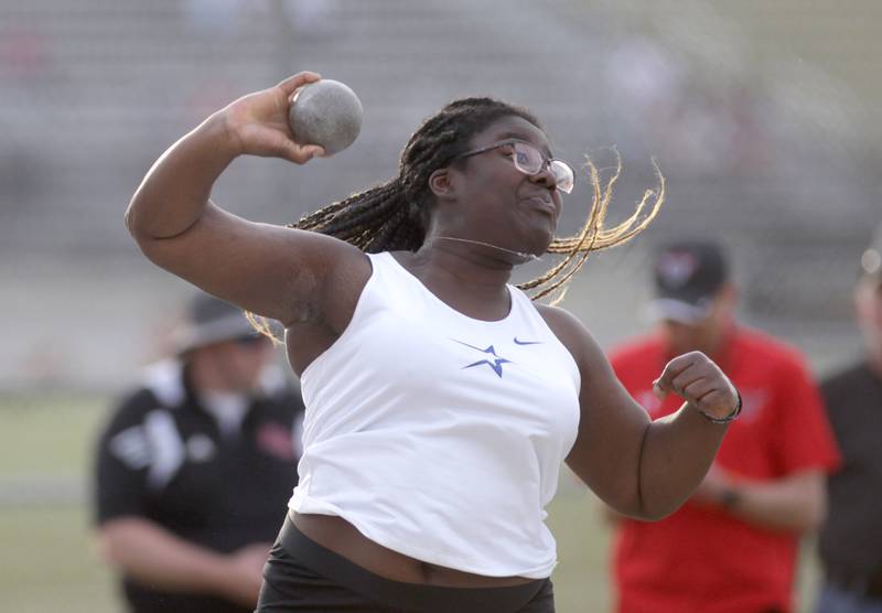 St. Charles North’s Tosin Oshin competes in the shot put during the Class 3A Metea Valley girls track and field sectional on Thursday, May 11, 2023.