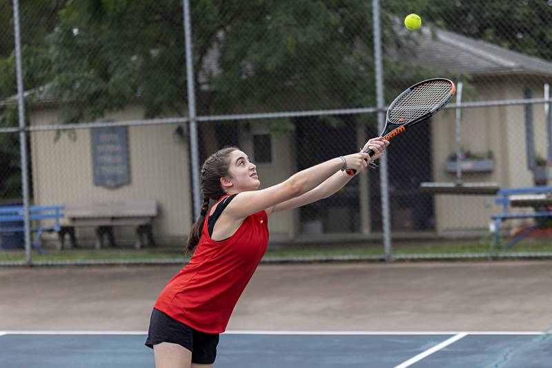 Jenna Mustapha reaches for the ball Wednesday, July 27, 2023 while playing mixed doubles in the Emma Hubbs Tennis Classic in Dixon.